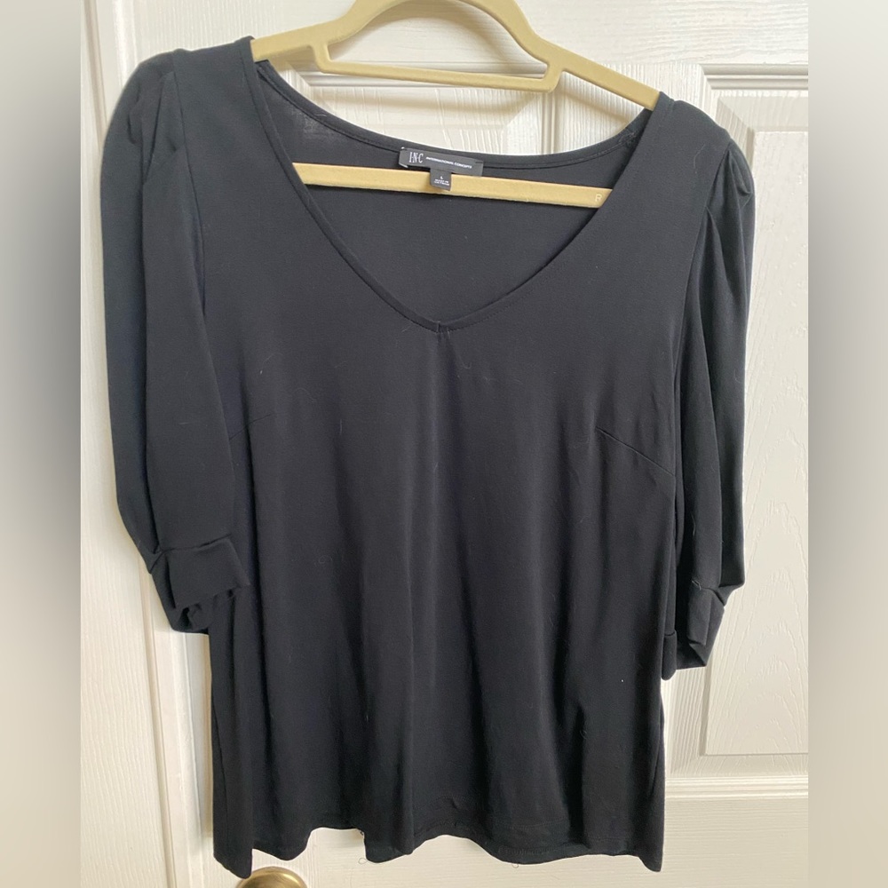 Ladies INC black puffed sleeve top.